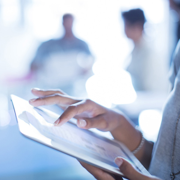Close up businesswoman using digital tablet