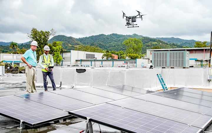 ICF disaster relief team in Puerto Rico testing out drones on a roof