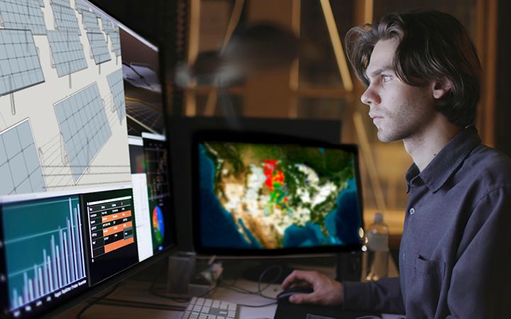 Man looking at data and solar panels