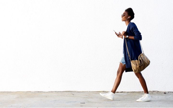 girl walking on the road