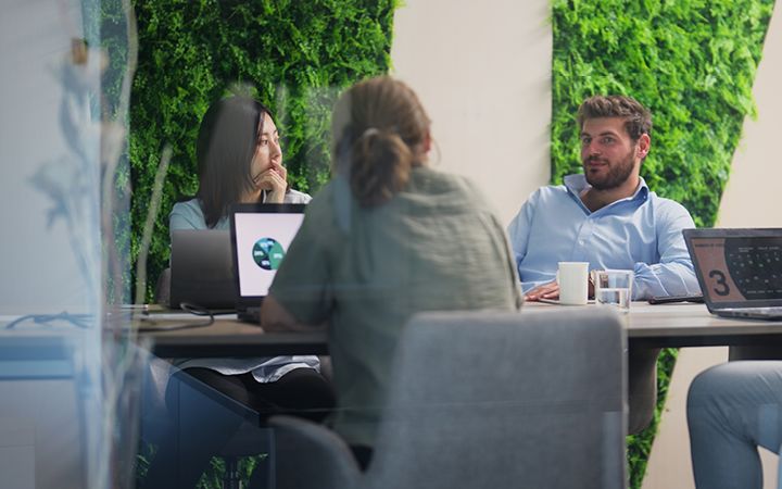Investors sitting at a table