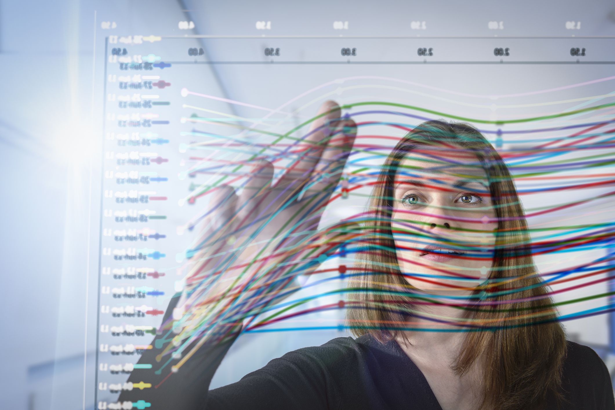 Energy Businesswoman Inspecting Graph Photo of businesswoman inspecting graph on interactive display
