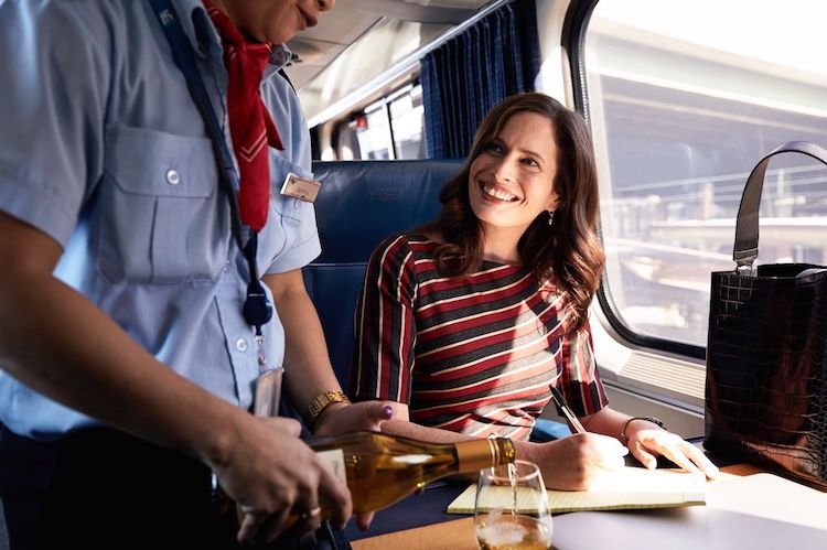 Passenger receiving customer service on Amtrak