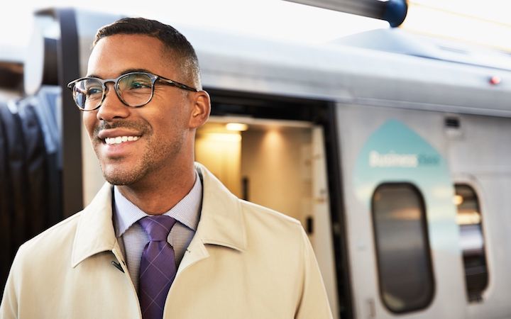Man standing outside at train station