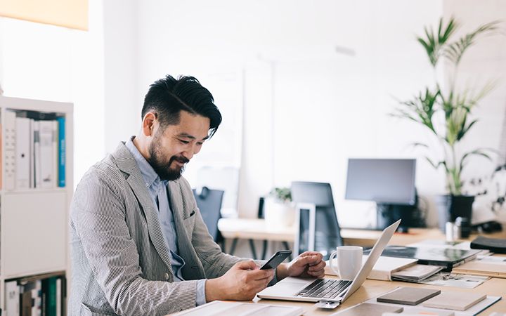 person working in office on computer