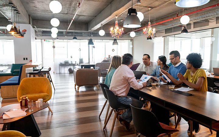 Coworkers discussing in a group