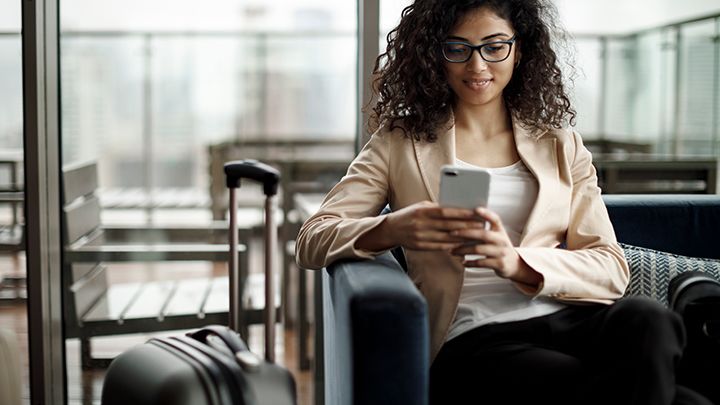 woman looking at phone